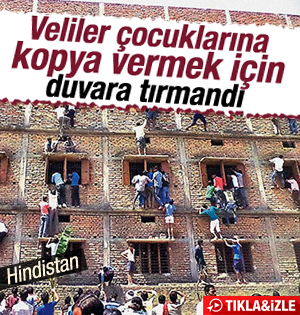 Veliler çocuklarına kopya verebilmek duvara tırmandı