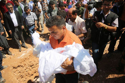 Minik Aylan, gözyaşlarıyla toprağa verildi